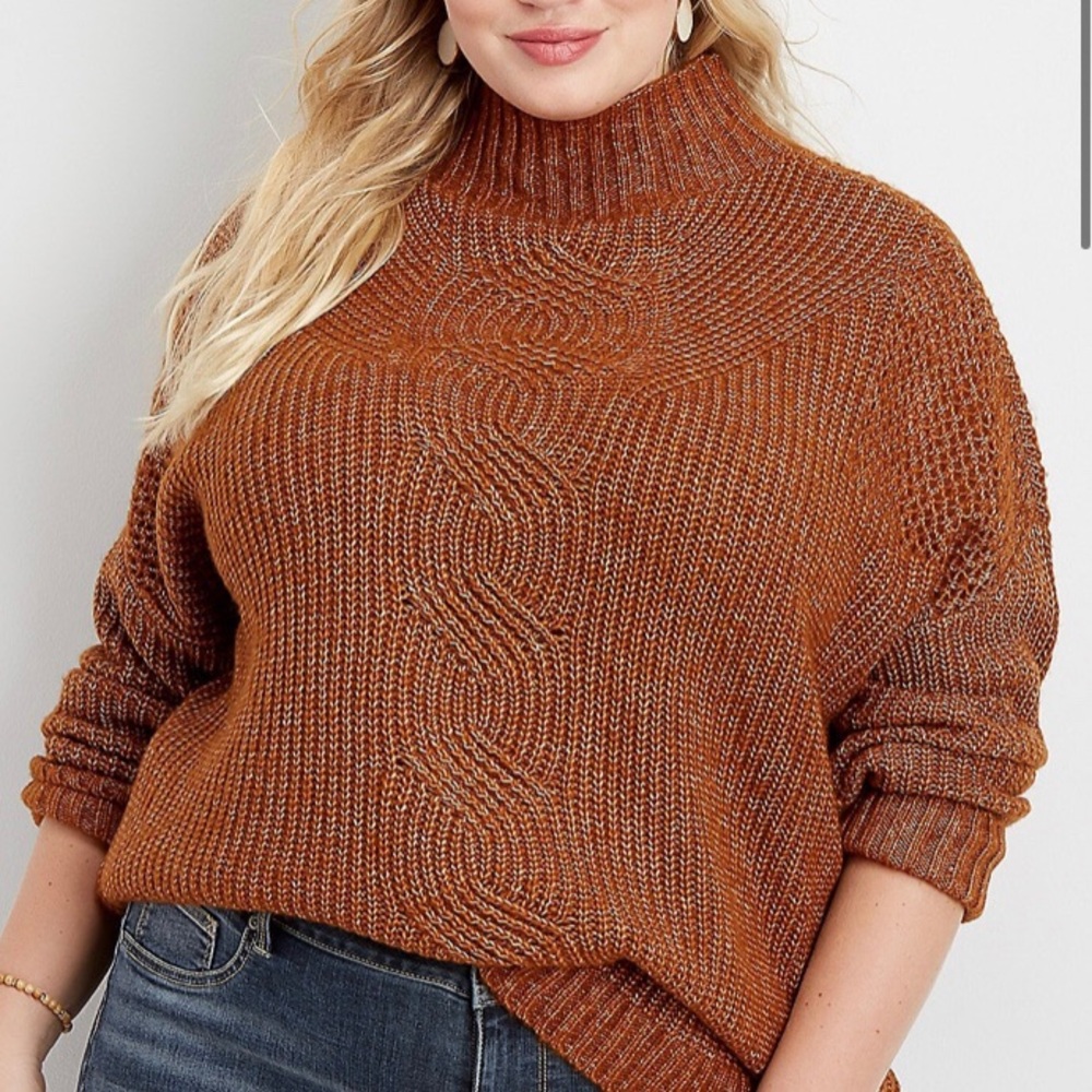 Oversized cable knit mock neck sweater